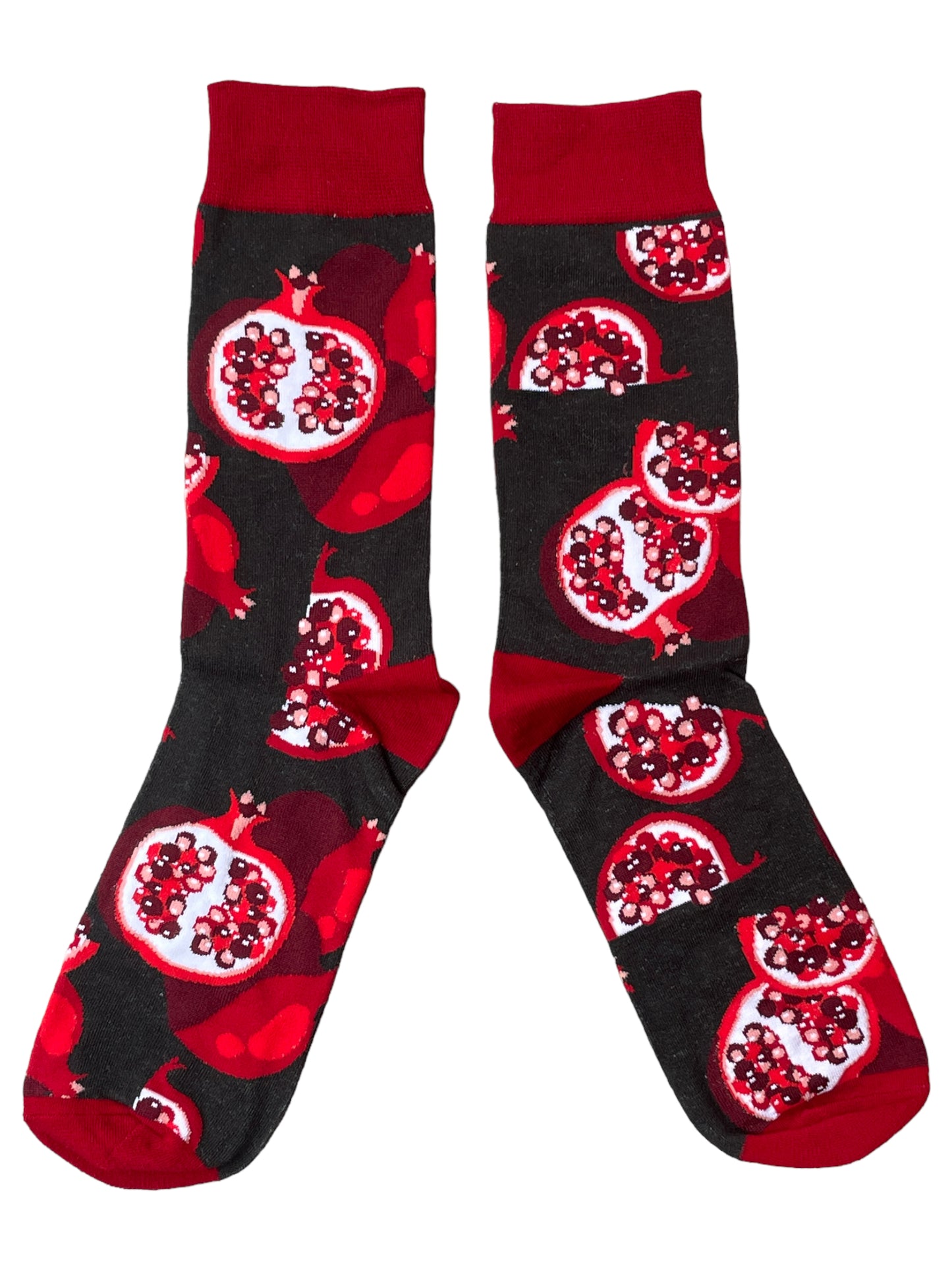 Reife, saftige Granatapfelscheiben, fruchtige Socken für Herren